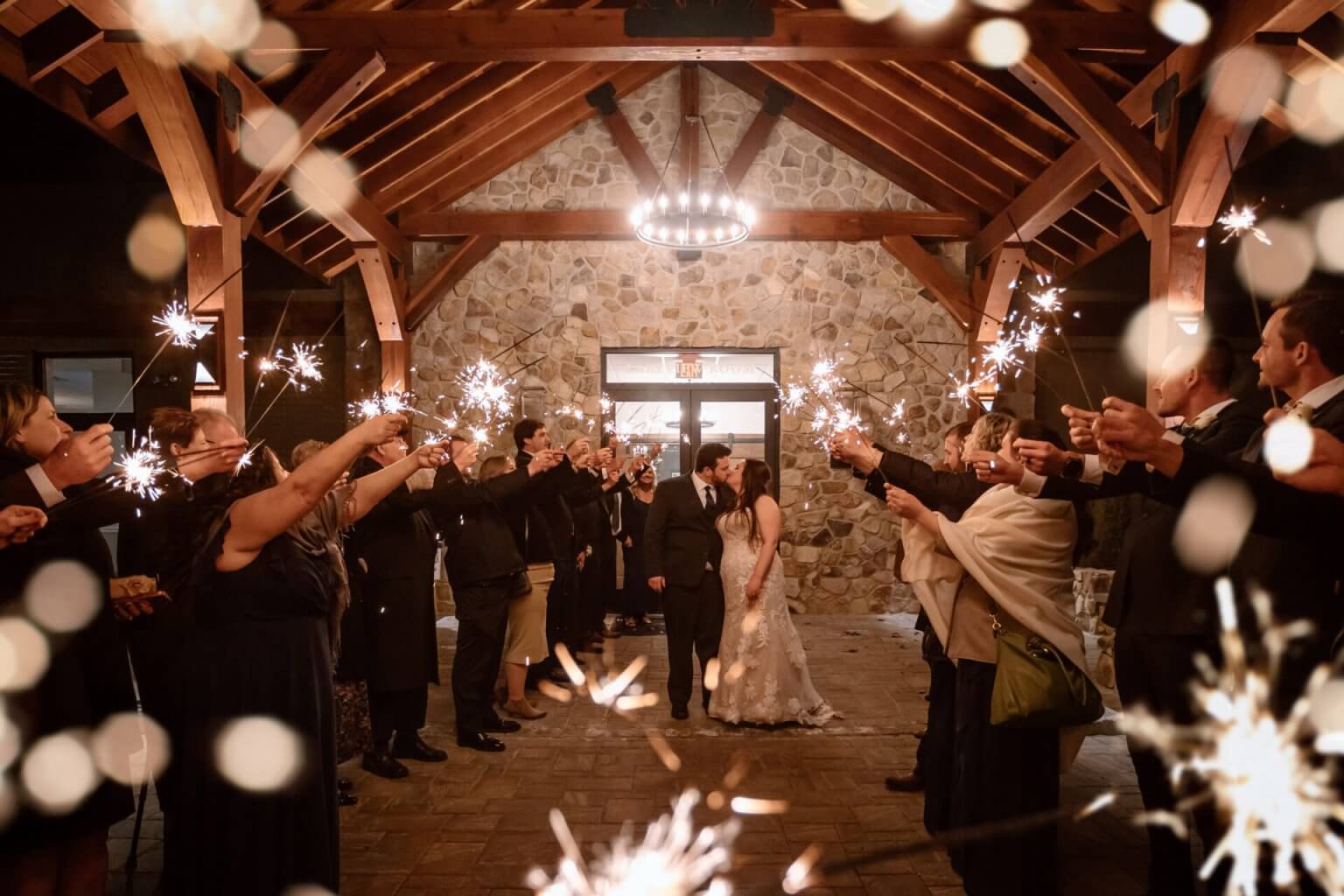 Wedding sparkler send-off under the pavilion