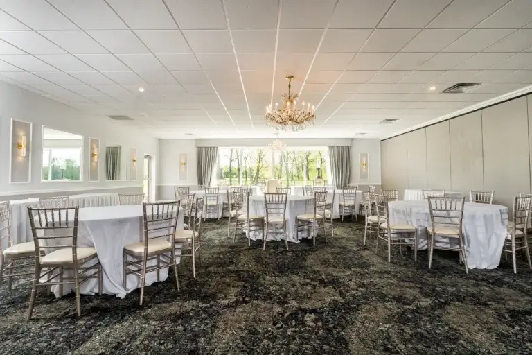 Intimate banquet room under a crystal chandelier