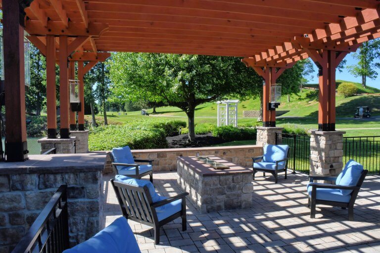 Blue cushions under the pergola, course beyond