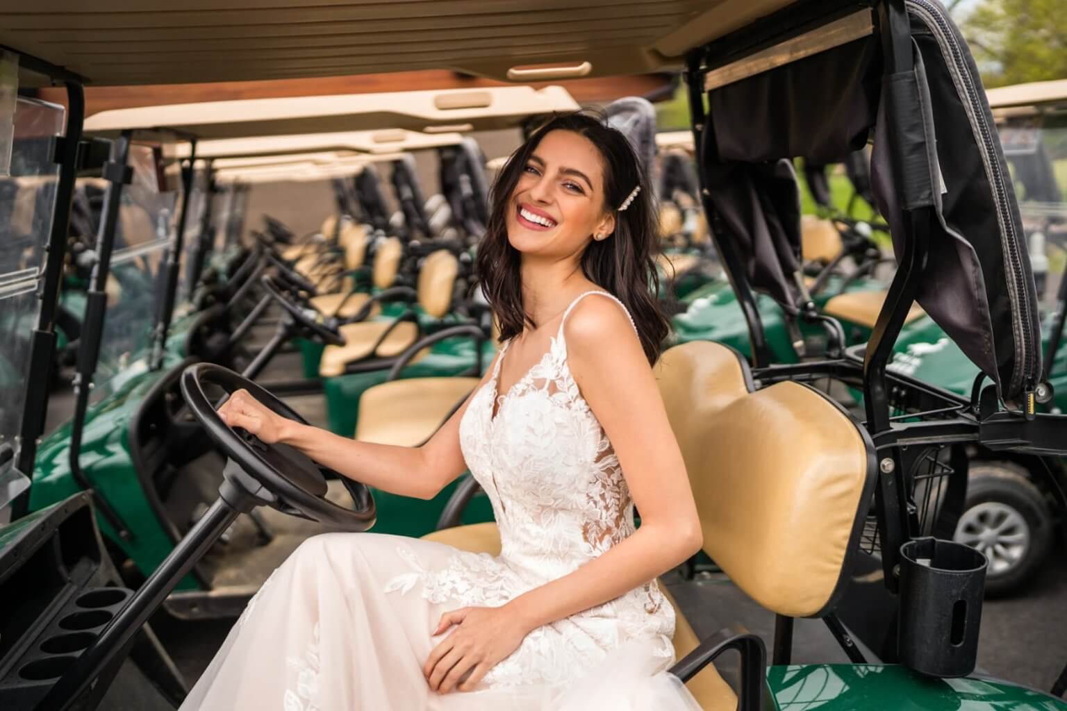 Lace gown, green fleet, wide smile
